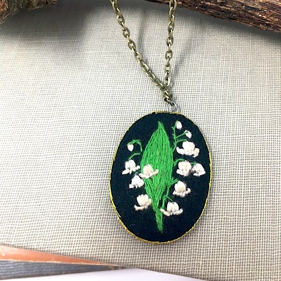 Hand Crafted Jewelry - Oval Hand Embroidered White and Cream Lily of the Valley Pendant Necklace